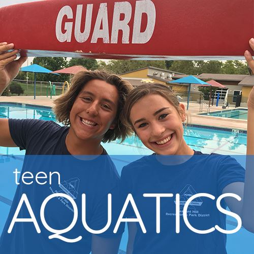 Two Teen Lifeguards Holding Rescue Tube