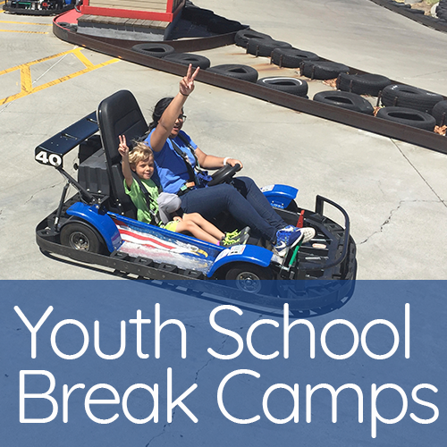 Adult and child riding in a go-kart